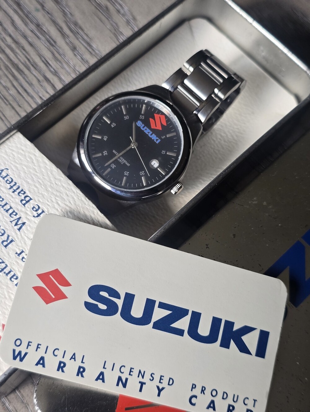 Suzuki Stainless Steel Logo Wristwatch - Black Dial